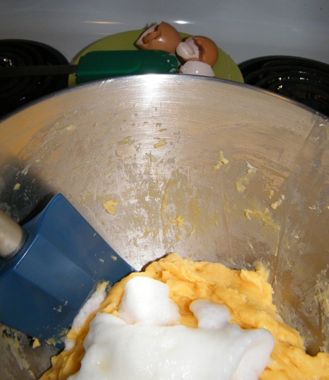 Folding egg whites into the choux paste