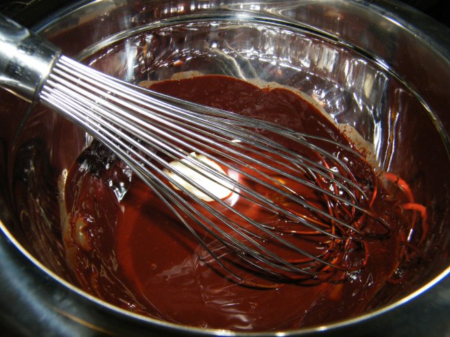 Whisking the butter into the chocolate