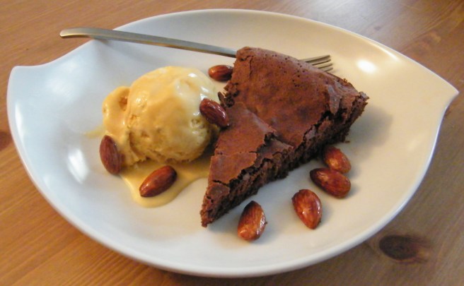Cake, caramel mousse and salted almonds