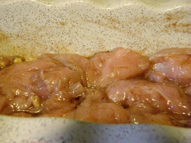 Marinating chicken.