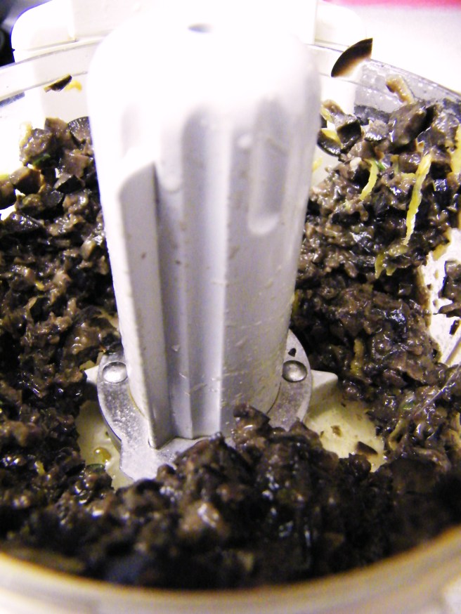 Black olive tapenade in the food processor.