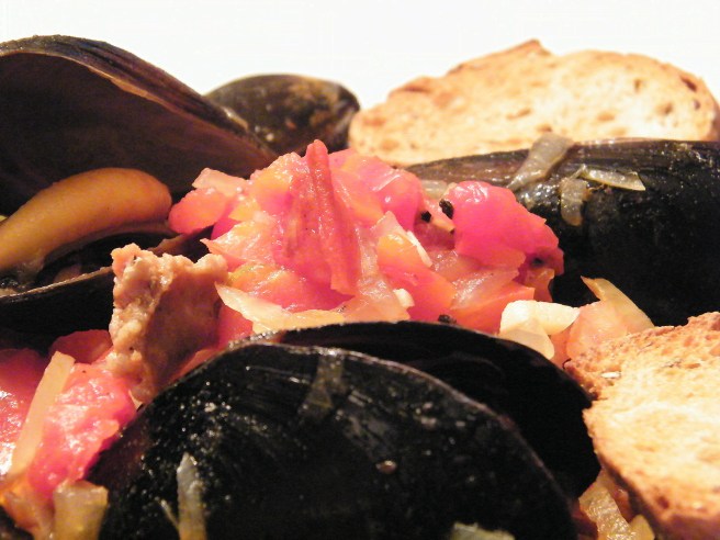 Mussels and chorizo up close Mussels and chorizo up close