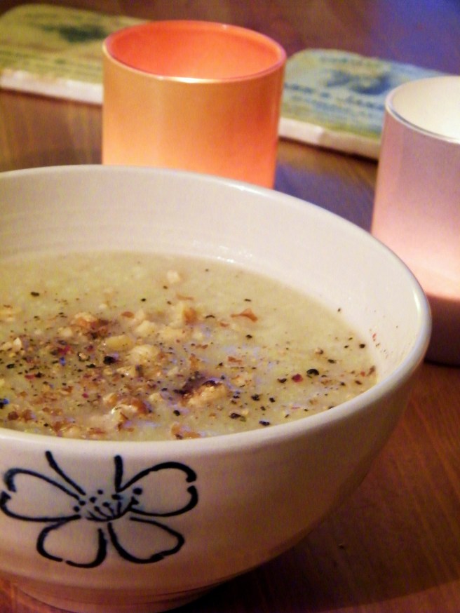 Cauliflower soup, on a dark afternoon, with candles