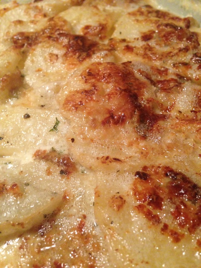 Scalloped potatoes with blue cheese and roasted garlic